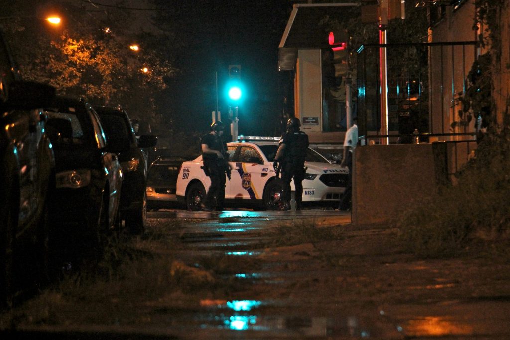 2019 08 15-e lee-north philadelphia-police shot Heavily armed police officers stand by at 15th and Erie while negotiators persuade a gunman to surrender. (Emma Lee/WHYY)