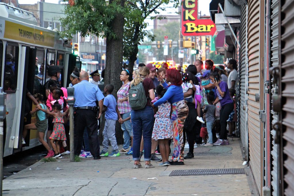 2019 08 15-e lee-north philadelphia-police shot daycare evacuation Children from the Precious Babies daycare are evacuated after a mass shooting in North Philadelphia. (Emma Lee/WHYY)