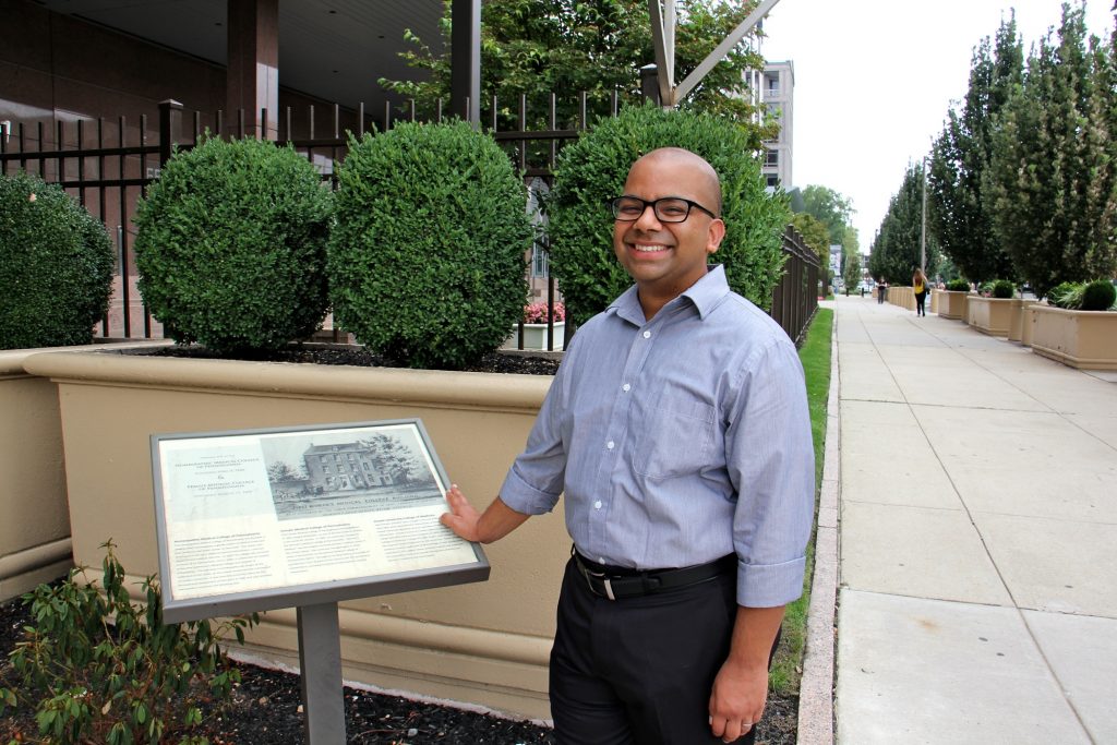 2019 08 21-e lee-samip mallick-philadelphia-south asian american walking tour of philadelphia Samip Mallik, director and co-founder of the South Asian American Digital Archive, stands at 6th and Arch streets, the former site of the Female Medical College of Pennsylvania. (Emma Lee/WHYY)