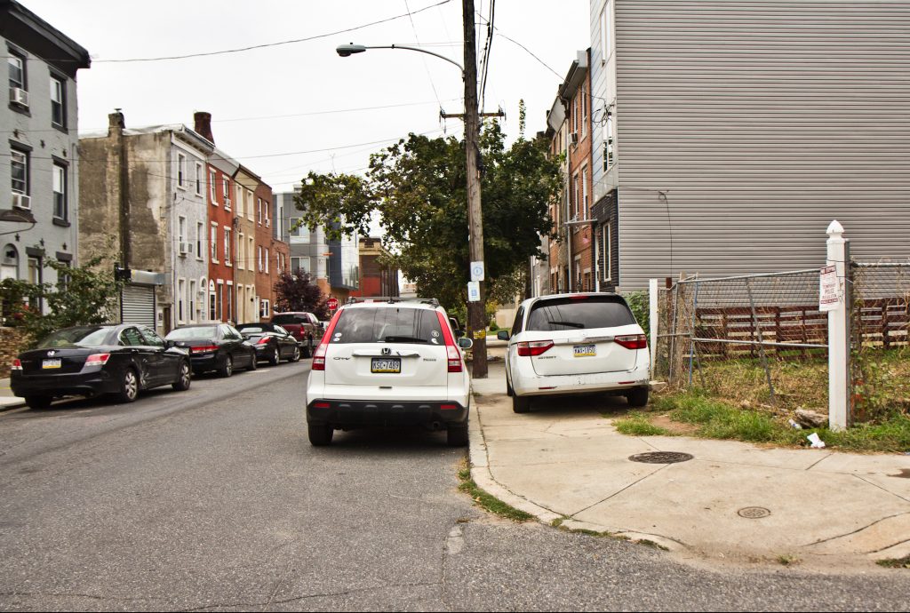 2019 08 27 kpaynter ada suit Cars park on the sidewalk on Coral Street