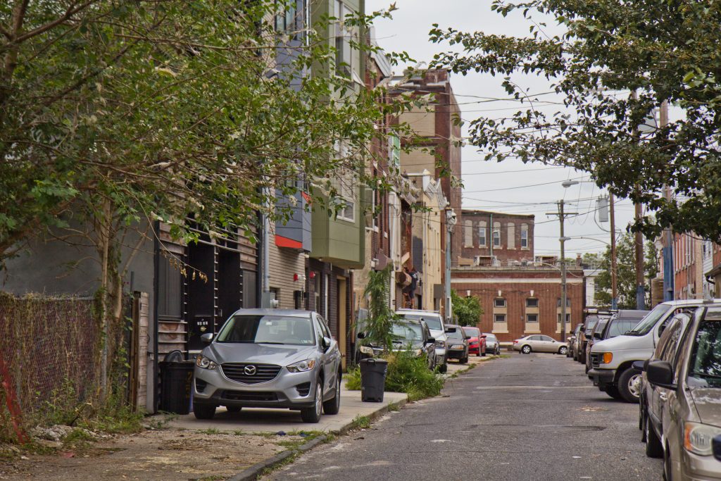 2019 08 27 kpaynterada suit Cars are parked on the sidewalk on Fletcher Street in Philadelphia’s East Kensington neighborhood.