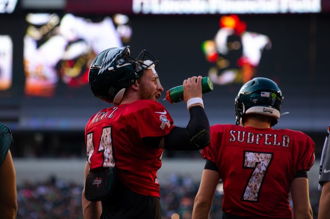Philadelphia Eagles quarterback Carson Wentz takes a drink during open practice held at Lincoln Financial Field on Sunday, August 4, 2019. (Kriston Jae Bethel for WHYY)