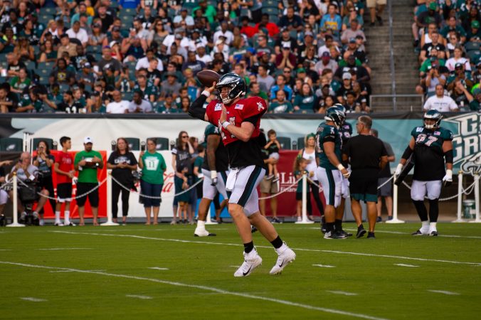 Philadelphia Eagles quarterback Carson Wentz throws a pass during drills at  open practice held at Lincoln Financial Field on Sunday, August 4, 2019. (Kriston Jae Bethel for WHYY)