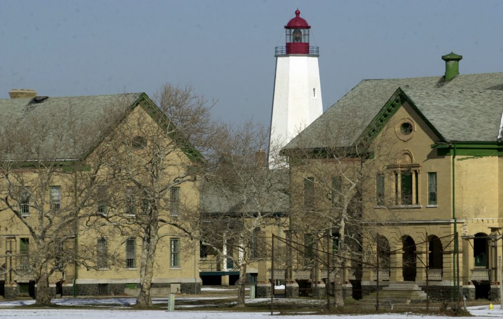 FORT TO RESORT The Sandy Hook lighthouse, first built in 1764, stands Jan. 22, 2002, behind buildings that were once part of the Army's Fort Hancock, located on Sandy Hook, N.J. (Mike Derer/AP Photo)