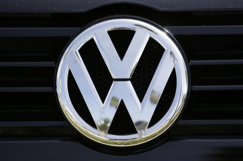 This Sept. 21, 2015, file photo, shows the Volkswagen logo on a car for sale at New Century Volkswagen dealership in Glendale, Calif. (Damian Dovarganes/AP Photo)
