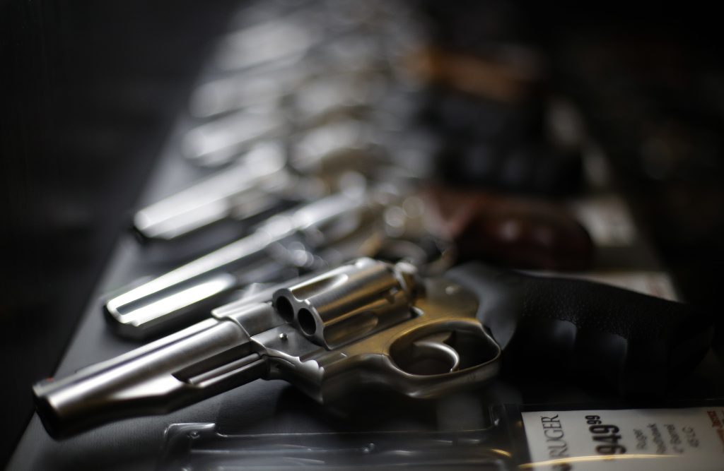 Gun Store Women More states have been relying on such laws in an attempt to prevent gun deaths by allowing people to tell law enforcement about warning signs of potential violence. (Charlie Riedel/AP Photo)