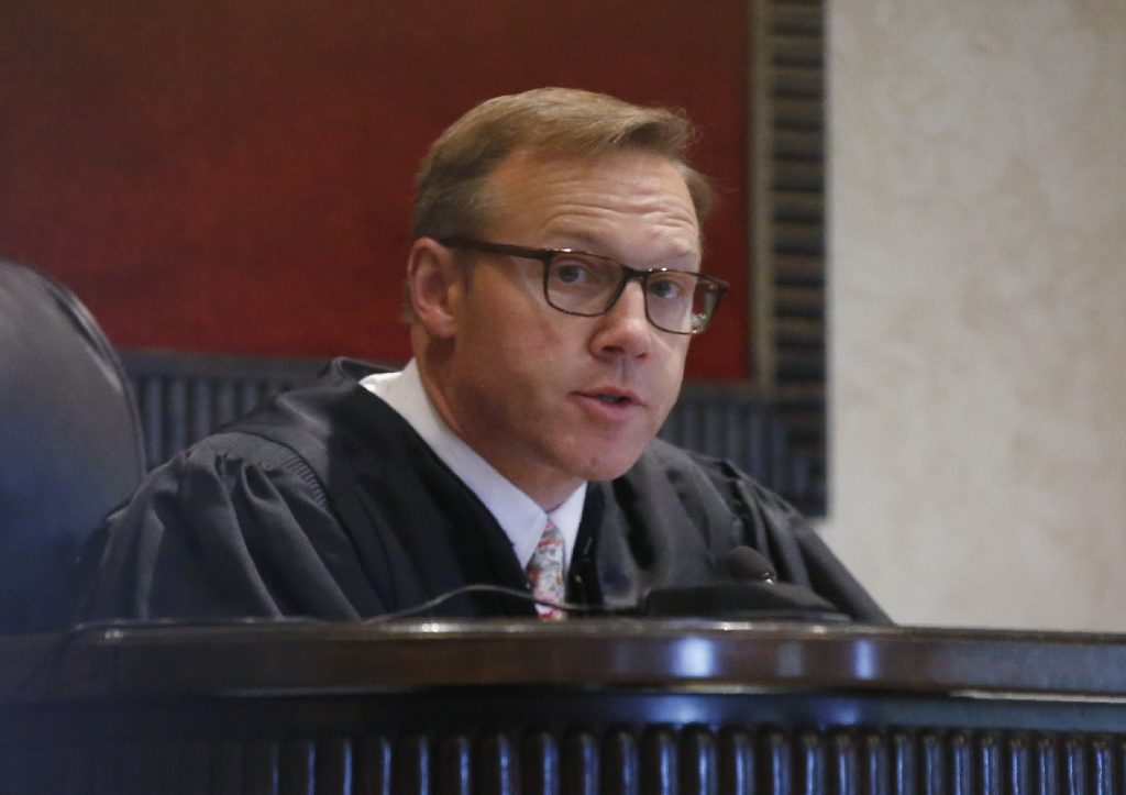 Thad Balkman In this Monday, July 8, 2019 file photo, Judge Thad Balkman speaks during Oklahoma's case blaming consumer products giant Johnson & Johnson and its subsidiaries for the state's opioid drug crisis, in Norman, Okla. (Sue Ogrocki/AP Photo, File)