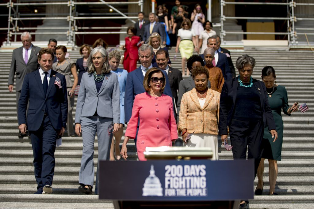 House Speaker Nancy Pelosi of Calif. and House Democrats arrive for a news conference on the first 200 days of the 116th Congress at the House East Front steps of the Capitol building, in Washington, Thursday, July 25, 2019. (Andrew Harnik/AP Photo)