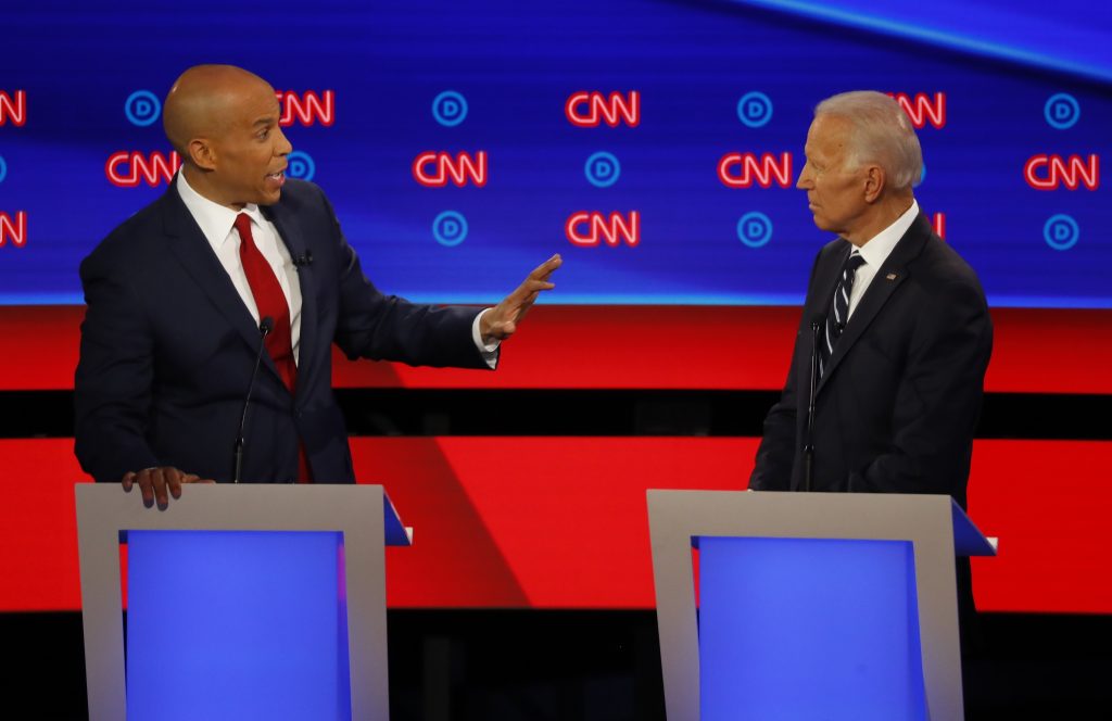 APTOPIX Election 2020 Debate Sen. Cory Booker, D-N.J., gestures to former Vice President Joe Biden during the second of two Democratic presidential primary debates hosted by CNN Wednesday, July 31, 2019, in the Fox Theatre in Detroit. (Paul Sancya/AP Photo)