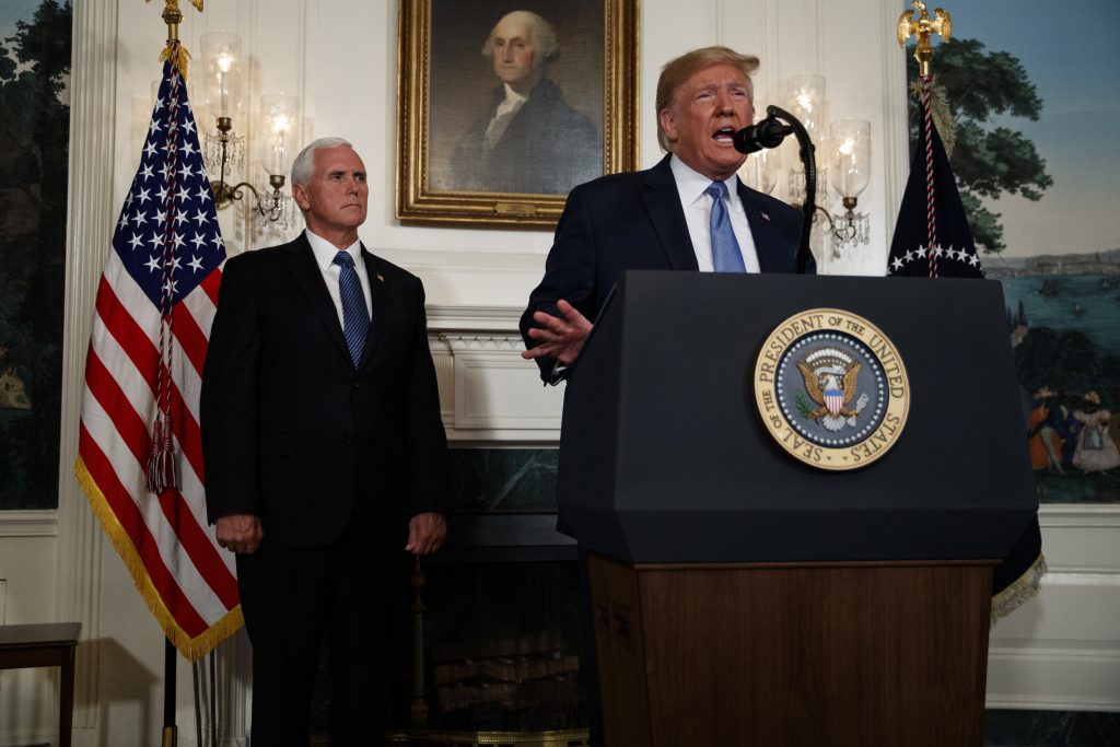 Donald Trump, Mike Pence Vice President Mike Pence listens as President Donald Trump speaks about the mass shootings in El Paso, Texas and Dayton, Ohio, in the Diplomatic Reception Room of the White House, Monday, Aug. 5, 2019, in Washington. (Evan Vucci/AP Photo)
