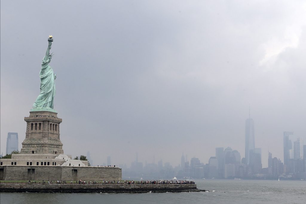 APTOPIX Immigration Statue Poem This photo shows the Statue of Liberty on a stormy afternoon in New York on Wednesday, Aug. 14, 2019. (Kathy Willens/AP Photo)
