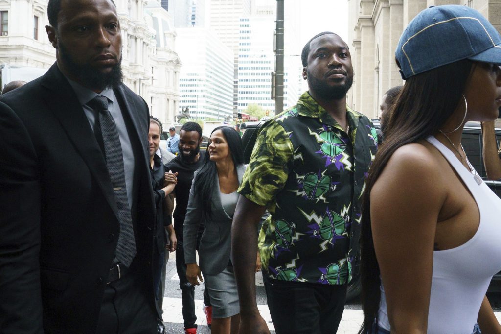 Meek Mill Rapper Meek Mill, (center), arrives at the Criminal Justice Center in Philadelphia on Tuesday, Aug. 27, 2019. (Jessica Griffin/The Philadelphia Inquirer via AP)