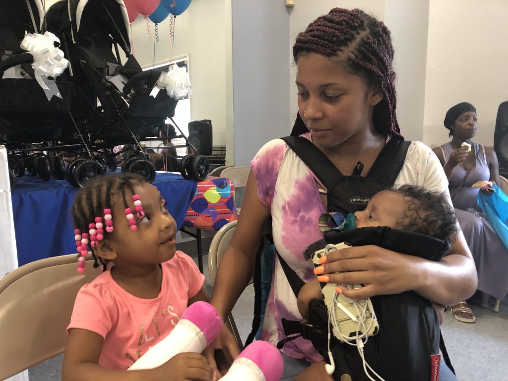 Dixon family Saadya Elliott Dixon attended the Harper’s Heart event at Kingswood with her daughters, Sariyah, who is 3 years old, and Samiyah. (Cris Barrish/WHYY)