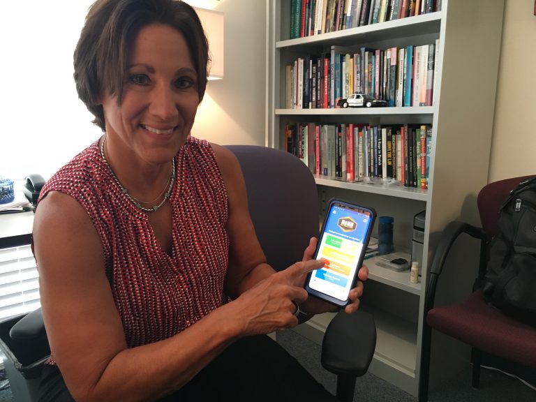 The HeNN app developed at the University of Delaware provides detailed information about help for those struggling with substance use disorder. (Mark Eichmann/WHYY)