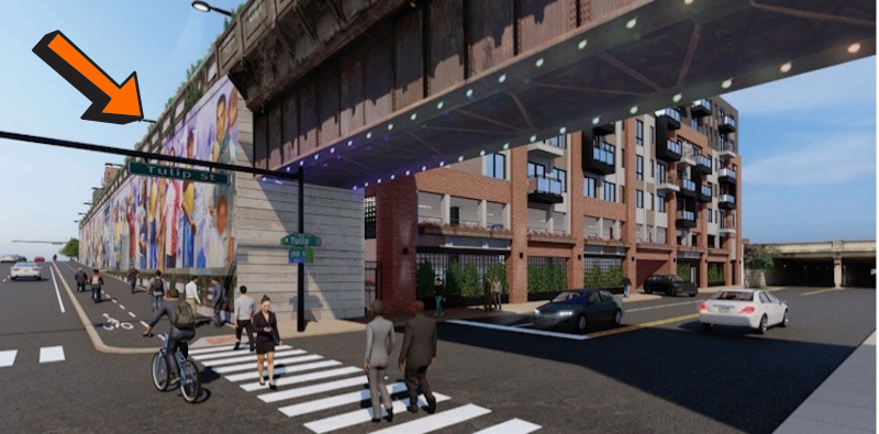An artist's rendering shows an apartment complex planned for 2157 E. Lehigh Ave. An arrow points to the old Conrail wall neighbors want to see torn down.