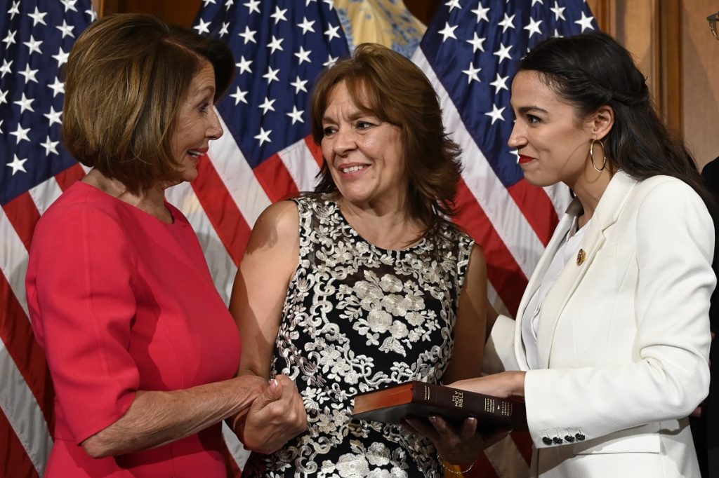Nancy Pelosi, Blanca Ocasio-Cortez, Alexandria Ocasio-Cortez House Speaker Nancy Pelosi of Calif., left, talks with Rep. Alexandria Ocasio-Cortez, D-N.Y., right, and her mother Blanca Ocasio-Cortez, center, during a ceremonial swearing-in on Capitol Hill in Washington, Thursday, Jan. 3, 2019, during the opening session of the 116th Congress. (AP Photo/Susan Walsh)