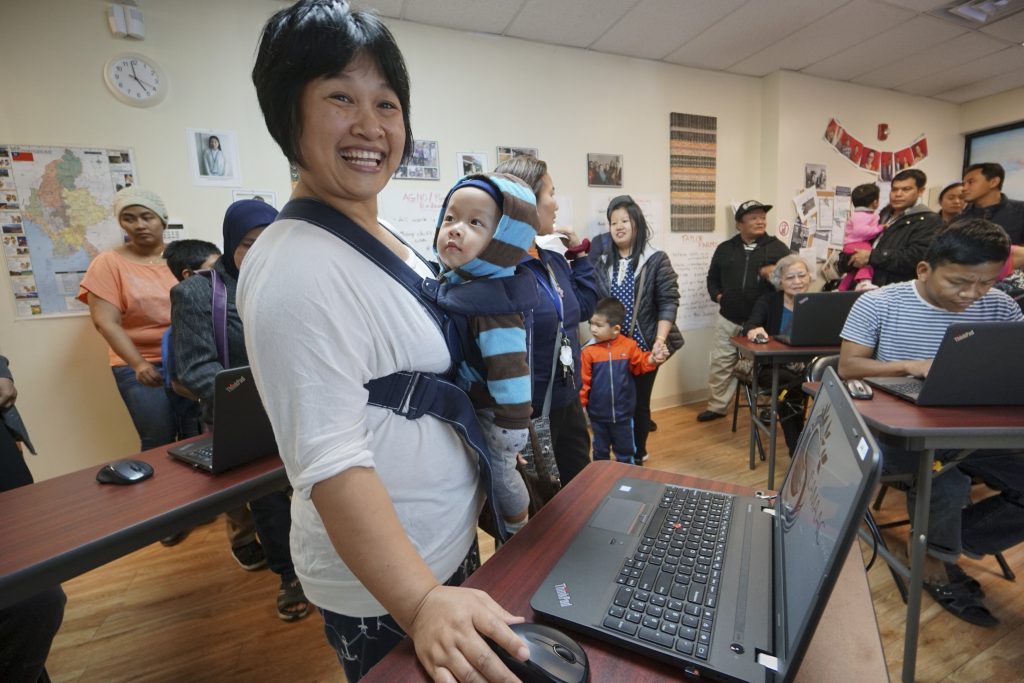 PSTRIKE03 Grand opening of the SEAMAAC Computer Literacy Lab, Thursday Nov. 3, 2016, inside the SEAMAAC Community Outreach Office in South Philadelphia. (Joseph Kaczmarek/Comcast)