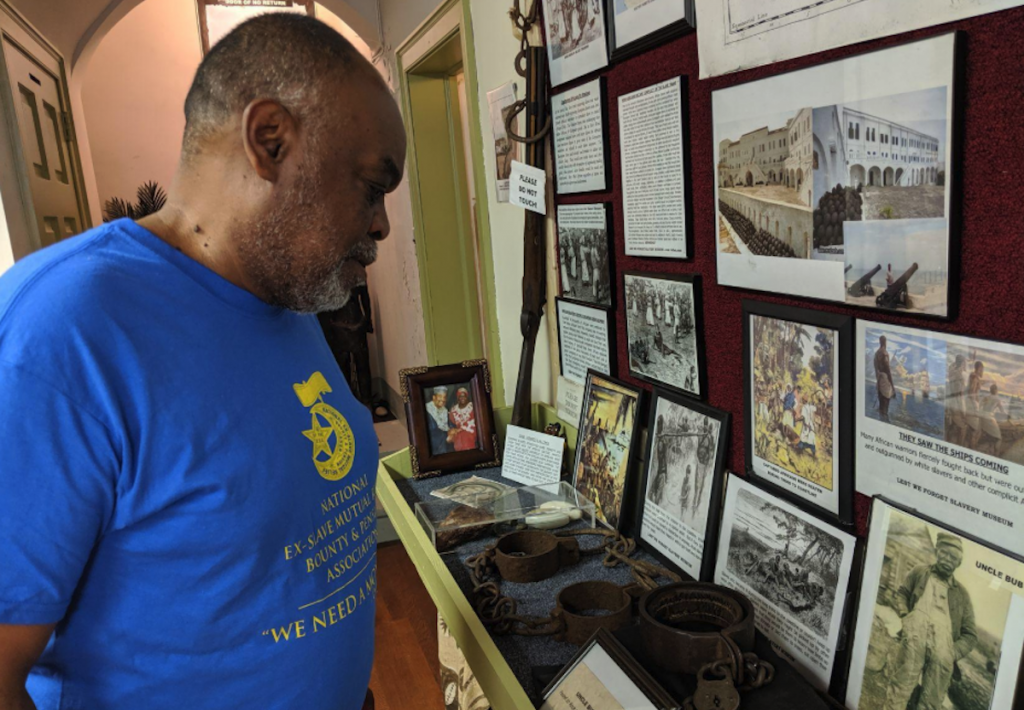 Screen Shot 2019-08-20 at 12.18.20 PM 'All this stuff touches home. It doesn’t go back that far,' says Germantown resident Mark Keenheel as he looks at items in the Lest We Forget Museum of Slavery recently in August. (Michael D'Onofrio/The Philadelphia Tribune)