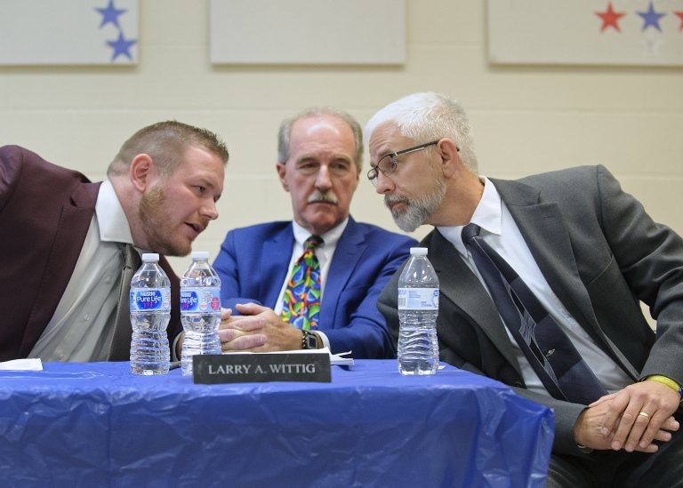 Tamaqua-Area-School-District-meeting-08-e1562794036988-768×549 Tamaqua School board member Nicholas Boyle (left) and School Board President Larry Wittig (center) are joined by Joe Egan, a representative of The Buckeye Firearm Foundation at a meeting in November 2018. (Matt Smith for Keystone Crossroads)