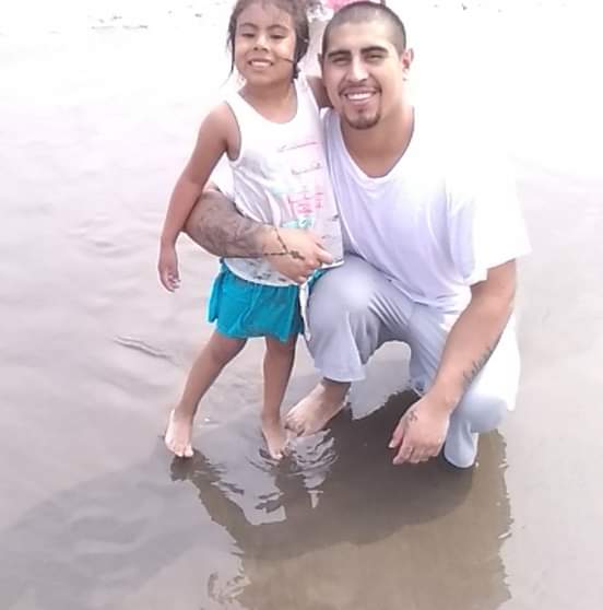 Cruz Eduardo Tinoco-Salvador stands with his arm around is daughter. (Provided by attorney Christopher Casazza)