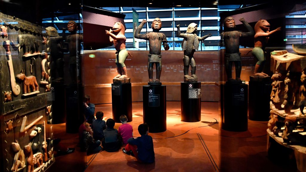 Big royal statues from the Kingdom of Dahomey, in present-day Benin, are pictured in 2018 at the Quai Branly Museum in Paris. Big royal statues from the Kingdom of Dahomey, in present-day Benin, are pictured in 2018 at the Quai Branly Museum in Paris. (Gerard Julien/AFP/Getty Images)