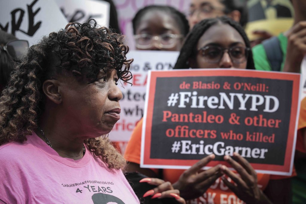 Gwen Carr (left), mother of Eric Garner, joins a “young people” rally in Federal Plaza to protest the decision by federal prosecutors last month not to bring civil rights charges against New York City police Officer Daniel Pantaleo over Garner’s death in 2014. Gwen Carr (left), mother of Eric Garner, joins a