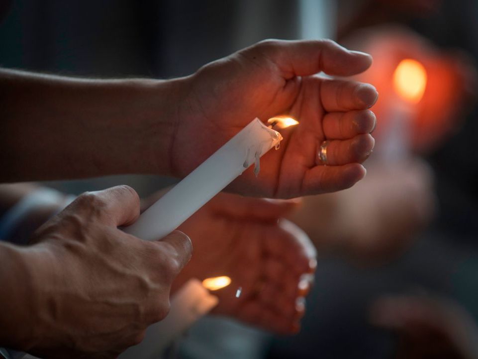 People light candles during a prayer and candle vigil organized by the city, after the recent shooting at a WalMart in El Paso, Texas. People light candles during a prayer and candle vigil organized by the city, after the recent shooting at a WalMart in El Paso, Texas.
(Mark Ralston/AFP/Getty Images)