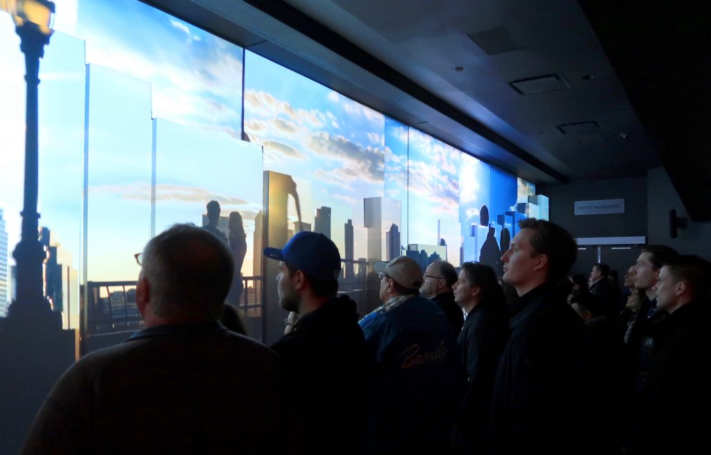 At One World Trade Center in 2017, visitors watch a movie at the New York City building’s observatory. Now there’s a new feature: A scent meant to complement the multimedia experience. At One World Trade Center in 2017, visitors watch a movie at the New York City building's observatory. Now there's a new feature: A scent meant to complement the multimedia experience. (Gary Hershorn/Getty Images)