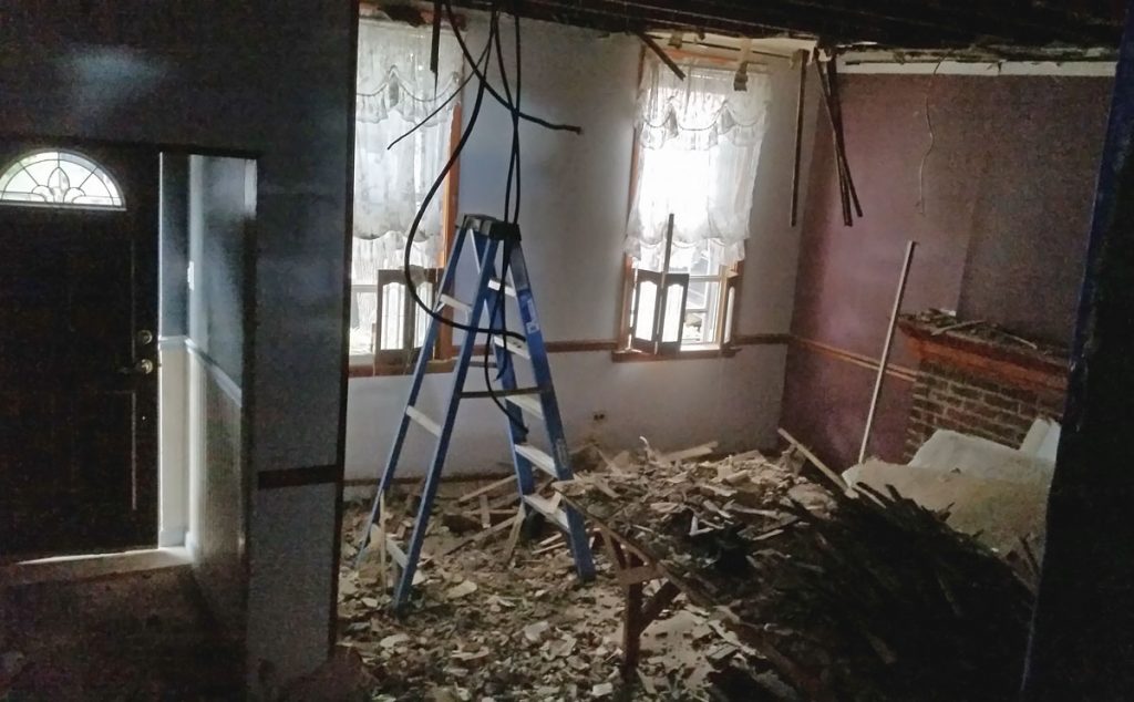 house_horrors_plaster_ceiling1200 Removing plaster from the ceiling involves yanking it down onto your head, until you are calf-deep in broken plaster. (Peter Crimmins/WHYY)