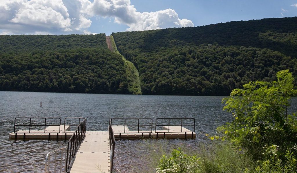 raystown_lake_01-e1531340991821-1920×825 File photo: In the distance, construction of the Mariner East 2 pipeline at Raystown Lake Recreation Area in Huntingdon County, Pennsylvania. (StateImpact Pennsylvania/Lindsay Lazarski)