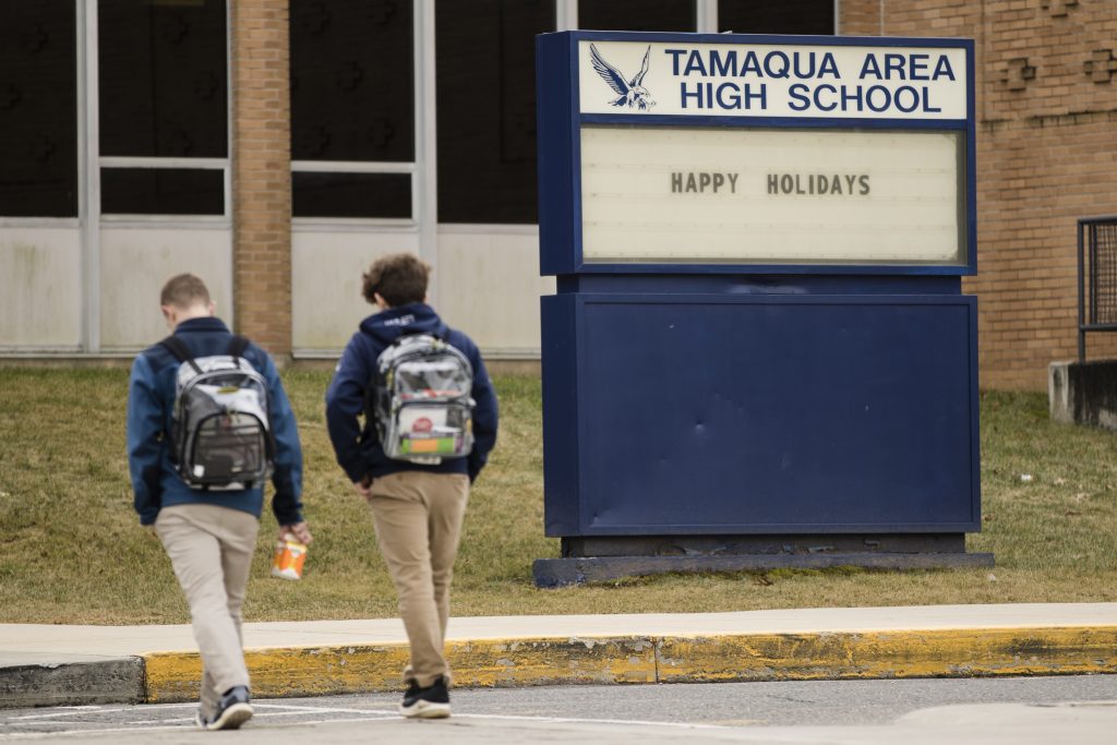 Arming Teachers Students walk to Tamaqua Area High School in Tamaqua, Pa., Friday, Jan. 4, 2019. Parents are going to court to block the Pennsylvania school district from allowing teachers to carry guns in school. (AP Photo/Matt Rourke)