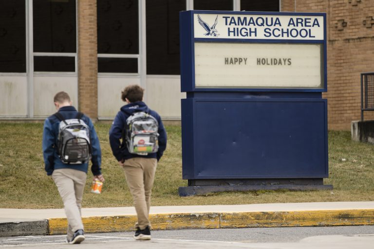 Students walk to Tamaqua Area High School in Tamaqua, Pa., Friday, Jan. 4, 2019. Parents are going to court to block the Pennsylvania school district from allowing teachers to carry guns in school. (AP Photo/Matt Rourke)