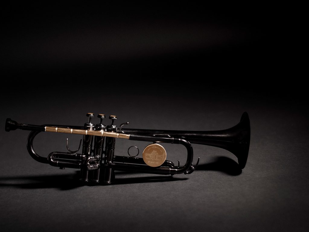 The Instrument of Hope is lacquered in black except for the shiny brass parts, which are clear lacquered. They include the lead pipe, which is made from bullets set end to end and drilled out so that air can flow through to make it a playable instrument. The tops of the three buttons are made of the sawn-off casing end caps or rims. The Instrument of Hope is lacquered in black except for the shiny brass parts, which are clear lacquered. They include the lead pipe, which is made from bullets set end to end and drilled out so that air can flow through to make it a playable instrument. The tops of the three buttons are made of the sawn-off casing end caps or rims. (Matt Mckay/Publicis North America)