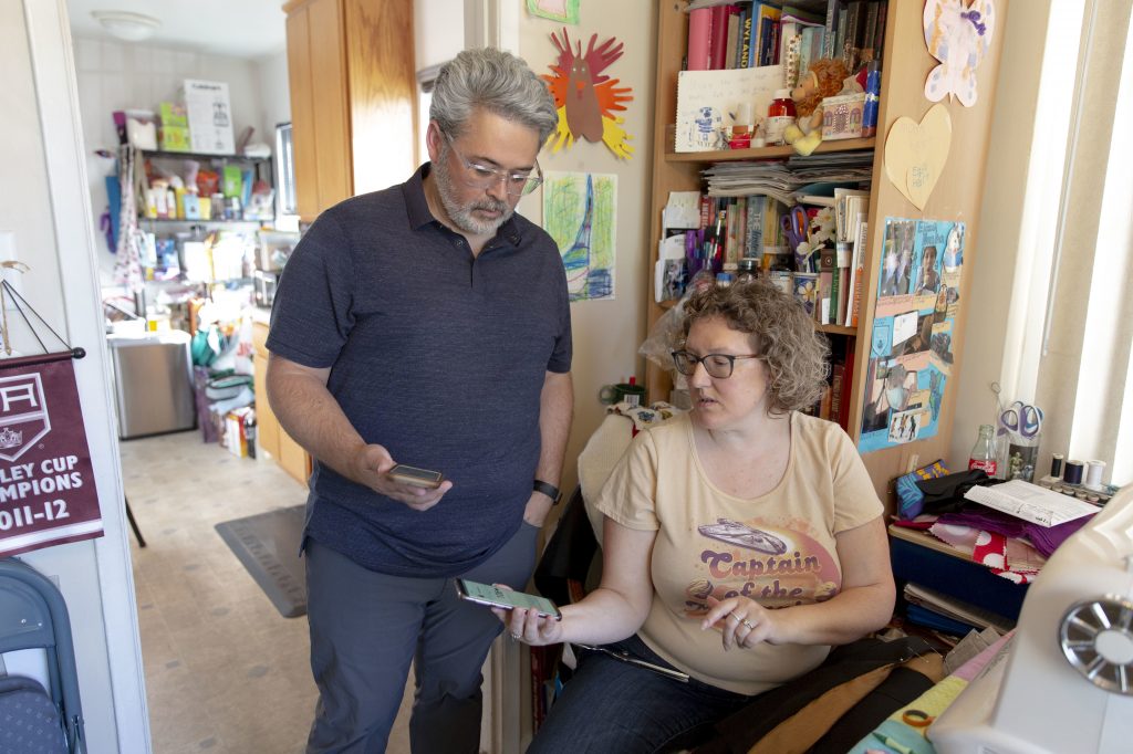 Ric Peralta and his wife Lisa are both able to check Ric’s blood sugar levels at any time, using the Dexcom app and an arm patch that measures the levels and sends the information wirelessly. Ric Peralta and his wife Lisa are both able to check Ric's blood sugar levels at any time, using the Dexcom app and an arm patch that measures the levels and sends the information wirelessly. (Allison Zaucha for NPR)