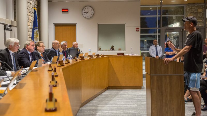 The township commissioners listen as constituent Jim Dougherty talks about how the closure of the fire company has affected his family. (Emily Cohen for WHYY)