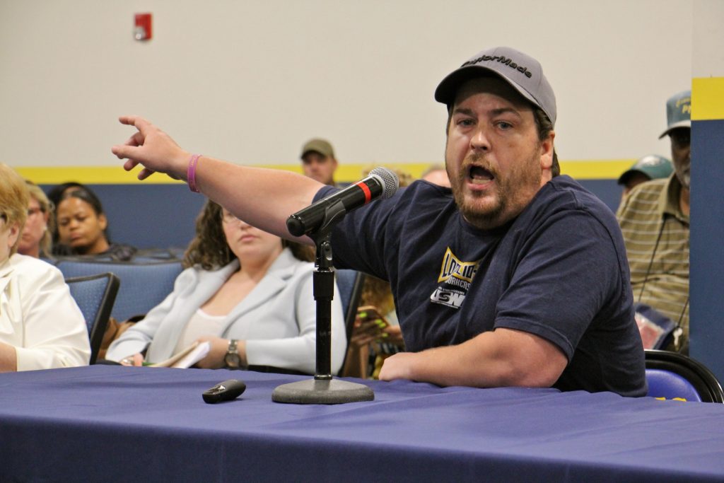2019 09 09-e lee-philadelphia-refinery committee meeting business Refinery employee Shawn Tolomeo argues that the Philadelphia Energy Solutions property in South Philadelphia should remain a refinery. (Emma Lee/WHYY)