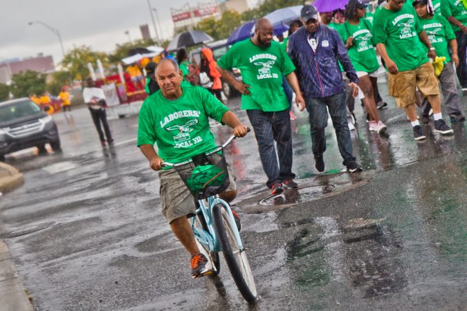 Members of the Laborer’s Local 332 march in Philadelphia’s 2019 Labor Day Parade. (Kimberly Paynter/WHYY)
