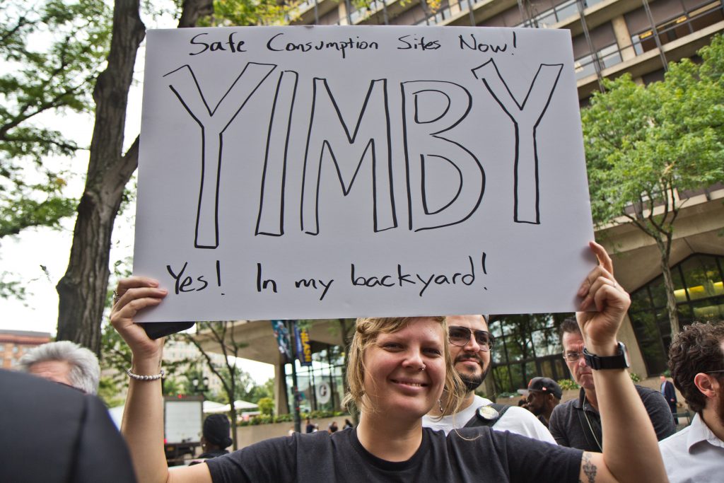 2019 09 5 kpaynter safehouse hearing-6 Naomi Wildflower, a resident of Philadelphia’s opioid plagued Kensington neighborhood, joined a rally of safe injection site supporters. (Kimberly Paynter/WHYY)
