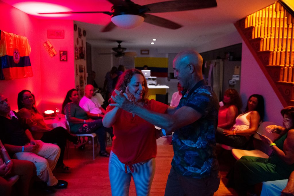 Liiana Acero dances with Eduardo Bru during the at-home vijoteca on Saturday, September 14, 2019. (Kriston Jae Bethell for WHYY)