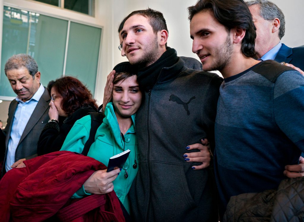 Syrian refugees arrive at John F. Kennedy International Airport in New York in 2017. (AP Photo/Craig Ruttle)