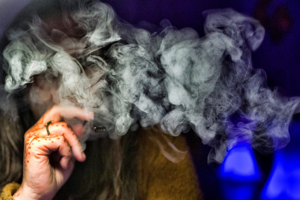 Vaping Lung Damage A woman takes a puff from a cannabis vape pen in Los Angeles. (Richard Vogel/AP Photo)