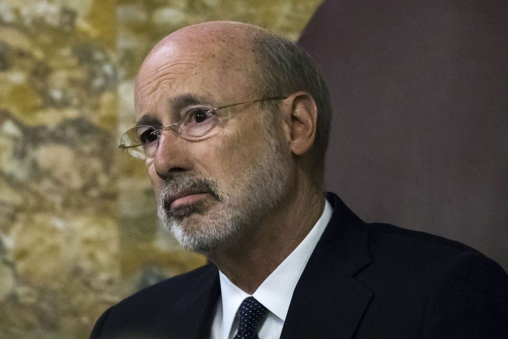 Governors Trip-Holocaust Memorials Gov. Tom Wolf listens as Pennsylvania lawmakers come together in an unusual joint session to commemorate the victims of the Pittsburgh synagogue attack that killed 11 people last year at the state Capitol in Harrisburg, Pa. (Matt Rourke/AP Photo)