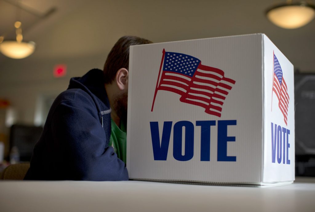 A voter fills out a provisional ballot by hand for the midterm elections at a polling place in Annapolis, Md., Tuesday, Nov. 4, 2014. (Carolyn Kaster/AP Photo)