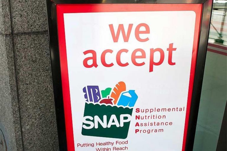 A sign indicates a store that accepts the Supplemental Nutritional Assistance Program or SNAP, the official name of the food stamp program. (File photo/The Columbus Dispatch/TNS)