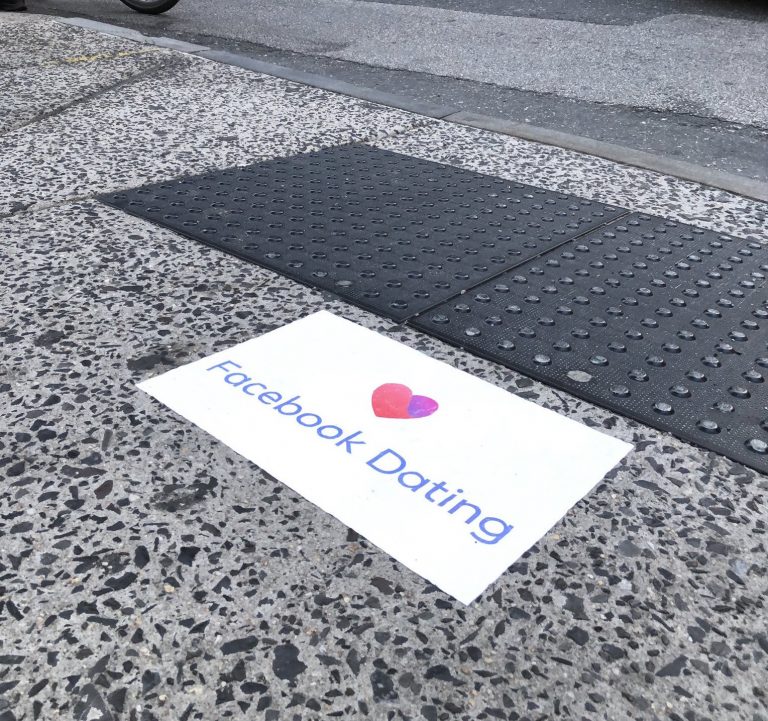 Facebook ads for the tech giant's new dating app appeared on Philly sidewalks this week. (Courtesy of Conrad Benner/Twitter)