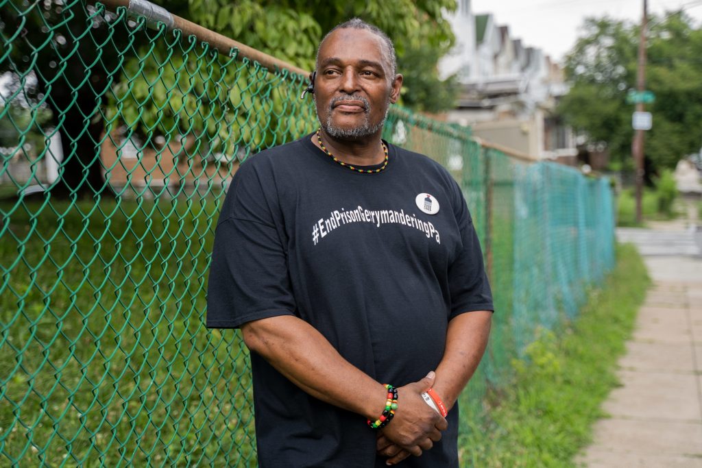 GERRY11-1316 Atiba Kwesi, 59, of Overbrook in West Philadelphia poses for a portrait outside of Fellowship Christian Church wearing a shirt reading