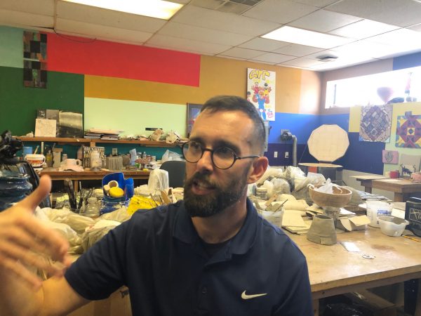 Michael Kalmbach, who runs the Creative Vision Factory, says everyone on staff “has lived experience.” (Cris Barrish/WHYY)