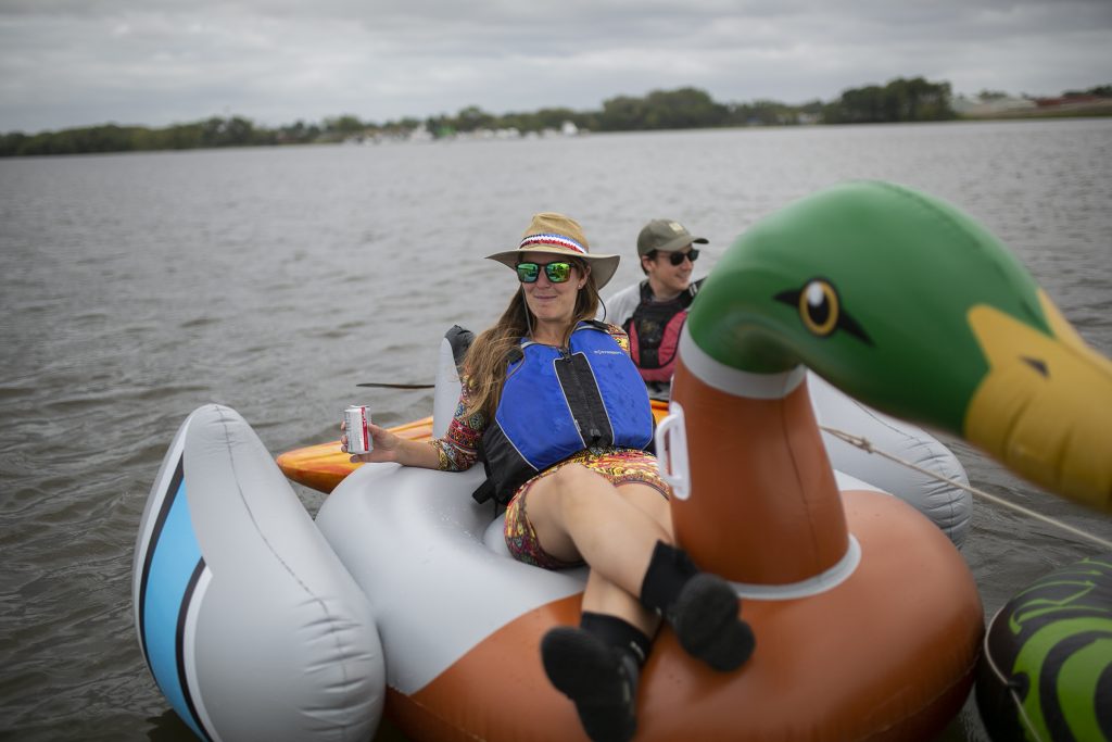 Hounds walk to help save others of their kind Erica Baugh of Upstream Alliance floats on the Delaware River in Pyne Poynt Park in Camden, N.J. (Miguel Martinez for WHYY)