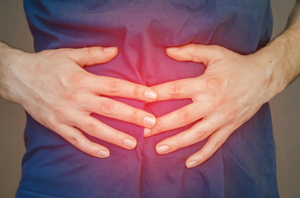 A Man Holding His Stomach. Pain In The Stomach, Stomach, Intestines. The Concept Of Medicine And Hea Bigstock