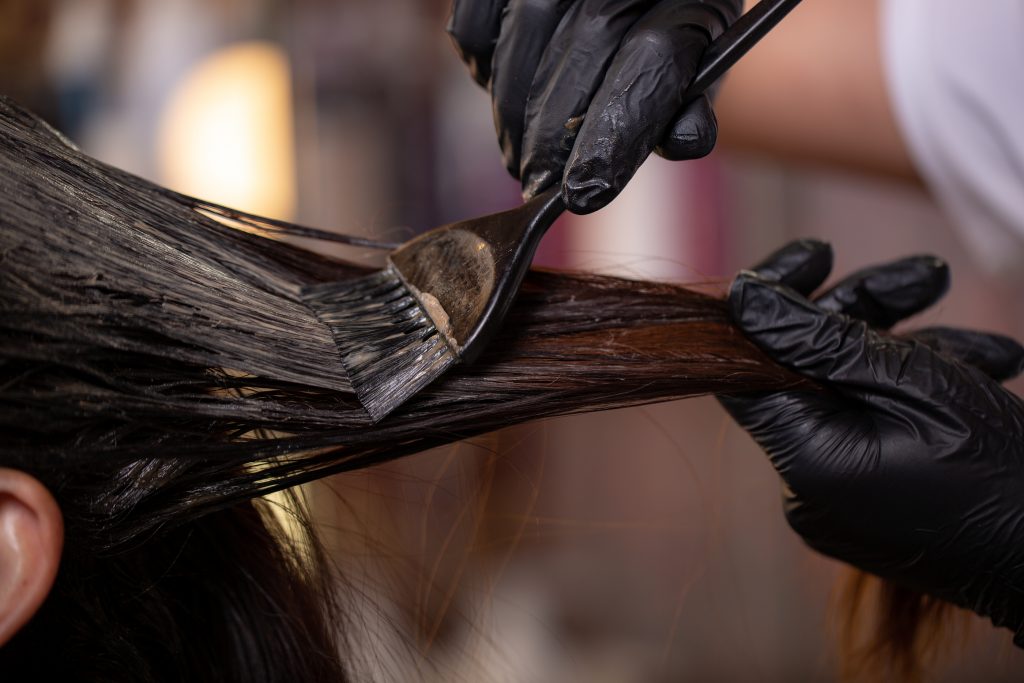 Hair Coloring In The Salon, Hair Styling. Professional Wizard Pa Because beauty products are not heavily regulated in the U.S., there is some concern about the unknown health risks of hair dyes. (Image courtesy of Gerain0812/Bigstock.com)